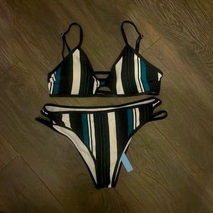 New with tags. Striped mid waist, cut out bikini